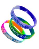 Three multi-colour silicone event wristbands promoting participation with customized branding from Custom Lanyards Canada.