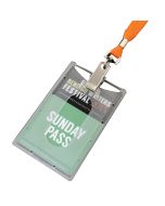 A closed tab ID card holder with a custom card inside and an orange lanyard attached by a croc clip.